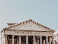 an old building with columns and the name maruppai - costreivmect on it