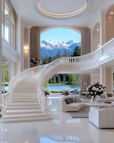 a living room filled with furniture and a spiral staircase in front of a large window