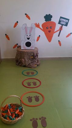 a child's playroom with carrots and bunny tracks