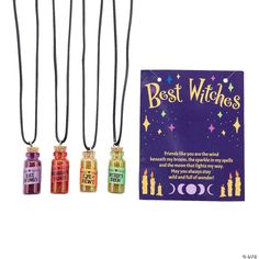 three necklaces with the words best witches written on them and a book in front