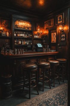 a bar with stools and bottles on the shelves