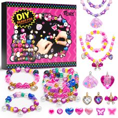 an assortment of bracelets, necklaces and earrings are shown in front of a box