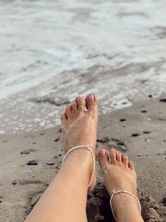 Elegant summer anklets composed of genuine fresh water mini pearls and silver lobster claw closure. Embellished with silver anchor charms. Please choose your size from the drop down menu. Price for 2 (a pair) Beautiful and original gift. Comes in our signature box, ready to gift. Handmade in Spain Free shipment worldwide. Summer Beach Anklets With Silver Beads, Adjustable Silver Pearl Anklets, Handmade Silver Strand Anklets, Adjustable Silver Anklets With Pearl Chain, Silver Anklets With Beads For Beach, Silver Anklets With Silver Beads For Beach, Silver Beach Anklets With Silver Beads, Beach Silver Anklets With Silver Beads, Adjustable Pearl Charm Anklets For Summer