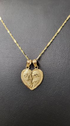 "💔 Half heart pendent that reads \"I LOVE YOU\" it comes in 16mm width by 16, tall. 💔 for both him & her 💏 with a 20\" in singapore style chain 💕 all for just $259.00! 😍 Gift box included." Pendant Ideas Gold, Half Heart Necklace, Gold Crucifix Necklace, Singapore Style, Crystal Jewelry Necklaces, 2024 Wardrobe, Heart Pendent, Half Heart, Crucifix Necklace