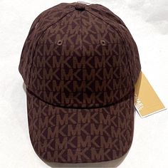 Michael Michael Kors Logo Baseball Cap Hat In Brown/Tan Also Available In Black/Grey And White/Grey (See Last 2 Pics, Video And Separate Listings) This Cute Cap/Hat Is 100% Cotton And Sports All-Over Mk Logo: - Brown Color With Tan All-Over Logo - Vent Holes - Adjustable Velcro Back - Gold Tone Hardware - Machine Wash Great Sporty Look For On-The-Go **Warning: These Are My Original Pictures And Listing And Are Not Permitted For Use Anywhere Else** See All My Listings Bundle Up To 5lbs And Save O Trendy Brown Visor Baseball Cap, Trendy Brown Baseball Cap With Curved Brim, Classic Brown Baseball Cap, One Size Fits Most, Classic Brown Baseball Cap One Size Fits Most, Brown Flat Brim Baseball Cap, One Size Fits Most, Brown Flat Brim Baseball Cap One Size, Brown Visor Hat One Size Fits Most, Cute Cap, Cute Caps