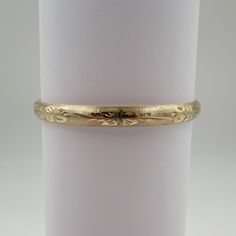 14 Kt Y.G. Engraved Bangle Yellow Gold Bangle With Decorative Band, Yellow Gold Bangle Bracelet With Decorative Band, Gold Bracelet With Decorative Band For Anniversary, Heirloom Yellow Gold Cuff Bracelet For Ceremonial Occasions, Ceremonial Heirloom Yellow Gold Cuff Bracelet, Ceremonial 14k Gold Engraved Bangle, Yellow Gold Etched Bangle, Traditional 14k Gold Engraved Bracelet, Heirloom 14k Gold Engraved Bangle