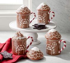 gingerbread hot chocolates in mugs with candy canes