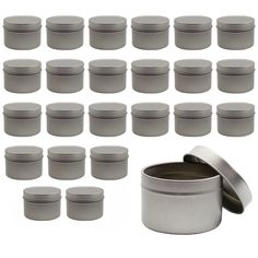 a set of twelve round tins with lids