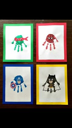 four handprints with different designs on them, one is for spiderman and the other