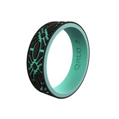 a black and green ring with an intricate design on the inside, against a white background