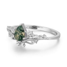 Our Lotus Moss Agate Ring© symbolizes courage and resilience. With beauty that speaks for itself, this stunning pear-shaped moss agate ring sits at the center of whimsical vines with glistening white topaz accents. May this nature-inspired masterpiece encourage you to bloom brilliantly no matter how muddy life may be. ✦ Available in both 14K white gold vermeil (14K white gold plated over a sterling silver base) and 10K solid white gold. Bff Rings, Moss Agate Ring, Vintage Diamond Rings, Ring White Gold, Agate Ring, Shop Engagement Rings, White Gold Ring, Engagement Ring Wedding Band, Moss Agate