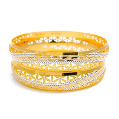 Elevate your style with our Upscale Decadent Bangle Pair. Crafted from 22k gold with a weight of 51.9 grams and a gorgeous finish of yellow and white gold, these bangles are a statement piece. With a size of 2.8 and an opening diameter of 2.5," this set of two bangles will add a touch of luxury to any outfit. PRODUCT DETAILS Gold Purity(karat): 22k Gold Weight(grams): 51.9 Item Finish: Yellow + White Gold Bangle Size: 2.8 Bangle Opening(diameter): 2.5" Number Of Pieces: 2 Bangles 22k Gold Filigree Bangle Bracelet, Yellow Bangle With Intricate Design, Formal 22k Gold Hallmarked Bangle, Hand Set 22k Yellow Gold Bracelets, Luxury 22k Gold Hand Set Bangle, Hand-set 22k Yellow Gold Bracelets, 22k Yellow Gold Bangle For Formal Occasions, 22k Yellow Gold Ceremonial Bangle, Gold Filigree Bangle For Anniversary