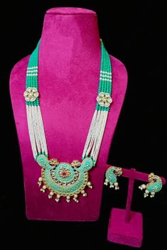 Kundan Long Necklace/ Indian Jewelry/ Ruby Lotus Necklace/ Victorian Pearl Necklace/ Indian Wedding/ Green Necklace Set/ Pakistani Jewelry WEAR THE RIGHT JEWELRY WITH A FABULOUS SMILE AND CONQUER THE WORLD* *WELCOME TO OUR SHOP * *We have made all the products for you with a lot of heart and happiness* *PRODUCT DETAILS* *LONG NECKLACE + EARRINGS* *ADJUSTABLE NECKLACE ( BACK SIDE AN ADJUSTABLE COARD)* *PUSH BACK EARRINGS* *BRASS , COPPER PLATED* *YOU CAN WEAR THIS BEAUTIFUL NECKLACE SET WITH ANY Pearl Necklace Indian, Long Necklace Indian, Green Necklace Set, Kundan Long Necklace, Jewelry Ruby, Wedding Green, Lotus Necklace, Necklace Indian, Pakistani Jewelry