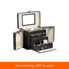 an open suitcase with jewelry in it and the words now trending $ 50 & under