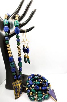 3pc. Chrysocolla and Lapis Lazuli Jewelry set comes with bracelet, earrings, and necklace. Made with Chrysocolla, gold pyrite, and lapis Lazuli stones. It's a Lapis Lazuli Tibetan horn L Signature, Lapis Lazuli Jewelry, Tiger Eye Jewelry, Lapis Lazuli Gemstone, African Inspired Fashion, Earrings And Necklace, Lapis Lazuli Stone, Eye Jewelry, Tiger Eye