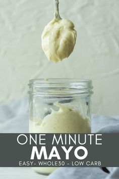 a spoon full of mayonnaise being lifted from a jar with the words, one minute mayonnaise easy whole - low carb