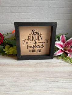 this kitchen is seasoned with love framed sign