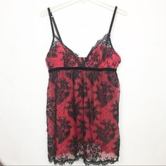 Victoria’s Secret Very Sexy Red Lace Babydoll. Size Medium. Nwot. Red And Black Lace Floral Red Tulle With Delicate Black Lace Very Lightly Padded Bust With No Wire Bra Like Closure Keyhole Back Adjustable Straps Babydoll Fit 100% Polyester. Excellent Condition No Known Defects O Flaws. Bust - 34 Inches. Underarm To Hem -18 Inches. All Measurements Are Approximate. Please See Photos For More Details. 0601s Red Party Sleepwear With Built-in Bra, Flirty Lace Sleepwear For Party, Red Camisole For Party, Victoria's Secret Camisole For Party, Red Coquette Sleepwear For Party, Red Lace Sleeveless Sleepwear, Red Sleeveless Lace Sleepwear, Red Sleeveless Party Sleepwear, Red Lace Babydoll