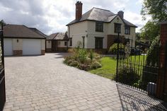 a large house with a driveway leading to it