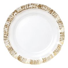 a white and gold plate on a white background with no one around it to see in the photo