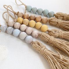 several beads and tassels laid out on a table