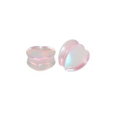 an image of two glass plugs with hearts on them