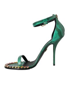 100% Authentic Dolce & Gabbana ankle strap heels sandals with crystal embellishment Made of 100% exotic snake skin leather in green color Buckle closure Multicolor crystals with logo details High quality and comfort Made in Italy Perfect for women who want to make a style statement! Material: 100% Exotic Snake skin Leather Crystal Logo, Crystal Sandals, Messenger Bag Backpack, Ankle Strap Sandals Heels, Boot Pumps, Green Material, Dolce E Gabbana, Heels Sandals, Crystal Embellishment