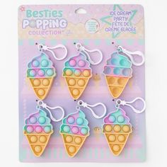 four ice cream cones are in the shape of key chains