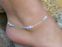 Stretch anklet is made with 4mm blue crystals, 6mm blue crystals and stretch cord. custom sizes available Blue Anklet, Boho Bridal Jewelry, Leather Anklets, Crystal Anklet, Swarovski Crystal Bracelet, Bridal Fashion Jewelry, Ankle Chain, Beaded Anklets, Silver Anklets