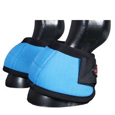 the back of a blue horse's saddle with black straps