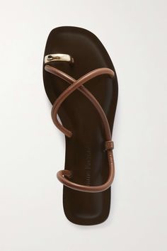 Brown Laurie leather and gold-tone sandals | EMME PARSONS | NET-A-PORTER Chic Leather T-strap Strappy Sandals, Chic Leather Strappy T-strap Sandals, Chic Sandals With Toe Loop And Strap, Chic Toe Loop Sandals With Strap, Chic Leather T-strap Slingback Sandals, Elegant T-strap Slingback Sandals For Beach, Chic Leather Toe Ring Sandals With Single Strap, Elegant Leather Toe Ring Sandals For Beach, Luxury Leather Strappy Slingback Sandals