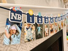 some pictures hanging on a clothes line with the name nb 11 / 2 in front of them