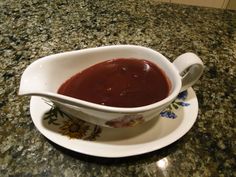 a sauce gravy in a bowl on a plate