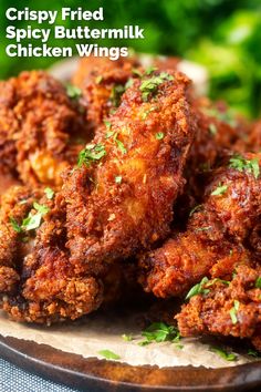 crispy fried spicy buttermilk chicken wings on a plate