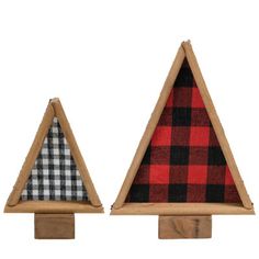 two wooden triangles with plaid fabric on them