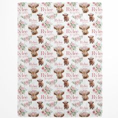 a sheet with pink flowers and brown bears on it