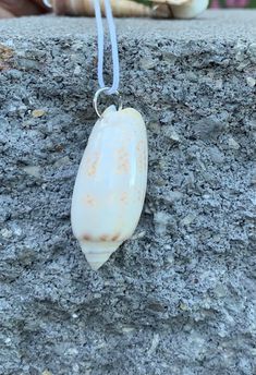 These one-of-a-kind shell pendants make the perfect gift for your girlfriend, mom, best friend, or treat for yourself! It also makes a wonderful anniversary or birthday gift to a loved one. Each one is individual, unique, beautiful and elegant simple necklaces. These pendants all come with a black or white waxed cotton cord, closed with lobster clasps- if you have a preference let me know in the comments. They have a light coat of resin giving them added strength and shine. All of my pieces are packed with care in a custom box and then sent in packaging designed to keep them safe.  The boxes are made of reused cardboard as part of my efforts to be more green so there are interesting designs on the inside. ♡ RECIPIENT IDEAS: - Mom - Sister - Girlfriend - Best Friend ♡ EXTRAS: If you like th Ocean-inspired Shell Necklace With Lobster Clasp For Gift, Shell Necklaces With Lobster Clasp For Gifts, Ocean-inspired Shell Pendant Necklace With Lobster Clasp, Pendant Shell Necklace With Lobster Clasp As Gift, White Shell Necklace As Gift, White Shell-shaped Necklace For Gift, White Shell-shaped Necklace For A Gift, Handmade Shell Pendant Necklace For Vacation, Handmade Shell Pendant Necklace For Beach