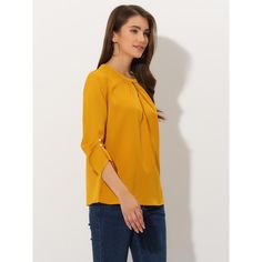 A comfy solid-color shirt is updated with perfectly pleated 3/4 sleeves for understated charm. Made of soft Chiffon fabric, this button-closure blouse with keyhole back detailing is designed for easy-to-wear, and ensures you stay comfy all day long. Styled with a simple round neck with a keyhole along with delicate pleated details on the 3/4 sleeves, it brings elegant impact to your basic wardrobe. Solid Color Workwear Tops With 3/4 Sleeves, Solid Workwear Tops With 3/4 Sleeves, Solid Color Top With 3/4 Sleeves For Work, Solid Color Tops For Workwear With 3/4 Sleeves, Solid Color Fall Blouse With 3/4 Sleeves, Basic Wardrobe, Solid Color Shirt, Wardrobe Basics, Office Casual