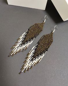 Shiny brown and white ombre earrings Made from Czech beads Length 5.2 inches(13.5cm) Width 1 inch(2.5cm) Silver clasp Miyuki Earrings, Neutral Earrings, Seed Bead Jewelry Patterns, Shiny Earrings, White Ombre, Beaded Jewels