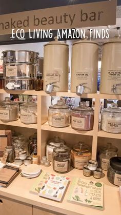 the shelves are full of various types of beauty products and jars on display for sale