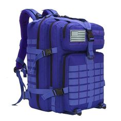 a blue backpack with an american flag patch on the front and back straps, sitting upright