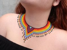 This choker is a unique piece made entirely by hand by Huichol artisans, very colorful boho style, to wear on any occasion. The Huichol artisans base all their works and their designs on visions they have during their sacred rituals proper to their ethnicity, The Huicholes inhabit the states of Nayarit, Jalisco, Zacatecas and Durango. Piece made by artisans nayaritas. Sent anywhere in the world from Tepic, Nayarit. Handmade Rainbow Beaded Necklace For Festivals, Bohemian Rainbow Choker As Gift, Bohemian Rainbow Choker As A Gift, Handmade Rainbow Beads For Festival, Handmade Rainbow Beads For Festivals, Colorful Beaded Choker For Festivals, Handmade Rainbow Beaded Choker Necklaces, Handmade Rainbow Choker Beaded Necklaces, Colorful Beaded Choker Necklace For Festival