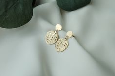 Simple yet outstanding these monstera leaf earrings are a perfect gift for all of the plant lovers or treat for yourself. Made of stainless steel, plated with 18k Gold, Anisa earrings are lightweight and so easy to wear.  A must have summer earrings.   All of our jewellery comes beautifully packaged in our branded gift box. Your jewellery will last longer if you correctly care for your item. Care instructions: Always remember to remove your jewellery before shower or exercise. Please avoid conta Leaf-shaped Earrings For Gift, Leaf-shaped Earrings As Gift, Minimalist Nickel-free Leaf-shaped Earrings, Monstera Earrings, Plant Earrings, Earrings Nature, Holiday Earrings, Earrings Summer, Summer Earrings