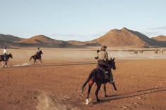 Horse riders canter the desert of Namibia in the Messum Crater. Horse Riding Safari, Horse In The Desert, Desert Horse Riding, Horseback Safari, Horse In Desert, Desert Riding, Horse Safari, Namibia Desert