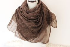 "Brown beige men's scarf, Cotton women's shawl, Striped men's scarf, Organic fabric, Plus size men's scarf, Cotton Large men's scarf, Women's men's gift option This beautiful light brown and beige scarf fabric is made from 100% natural cotton and organic fibers. It is embellished with rib stitching. It is suitable for sensitive skin. Definitely not allergic. Admire the beautifully flowing fabrics. Very harmonious colors and smooth color transitions. With its natural wrinkled appearance, it is ve Classic Brown Shawl Scarves, Brown Casual Shawl Scarves, Casual Brown Shawl Scarf, Men Scarf, Beige Scarf, Men's Scarf, Organic Fabric, Large Scarf, Striped Scarves