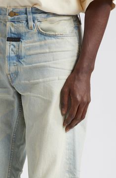 From the label's 8th collection come these American-made straight-leg jeans crafted from nonstretch Japanese denim and ending with unfinished hems. 33" inseam; 16 1/2" leg opening; 11" front rise; 15" back rise (size 32) Button fly Five-pocket style 100% cotton Dry clean Made in the USA Designer Clothing Black Owned/Founded Designer Straight Leg Jeans For Streetwear, Designer Streetwear Bottoms With Five Pockets, Designer Jeans With Five Pockets For Spring, Designer Spring Jeans With Five Pockets, Jean Crafts, Clothing Black, Japanese Denim, Fear Of God, American Made