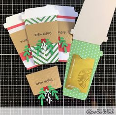 four starbucks gift cards are sitting next to each other on a piece of paper that says warm wishes, warm wishes and warm wishes