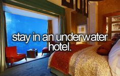 a hotel room with an ocean view and the words stay in an underwater hotel