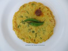 a plate with some food on it and a green pepper sticking out of the top