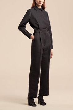 Faille Jumpsuit Luxury Long Sleeve Formal Pantsuit, Sleek Formal Jumpsuits And Rompers, Chic Pantsuit With Pressed Crease And Long Sleeve Jacket, Chic Long Sleeve Pantsuit With Pressed Crease, Elegant Long Sleeve Pantsuit With Pressed Crease, Elegant Long-sleeved Pantsuit With Pressed Crease, Tuxedo Style Pantsuit With Hidden Button Closure For Work, Elegant Pantsuit With Pressed Crease For Work, Elegant Workwear Pantsuit With Pressed Crease